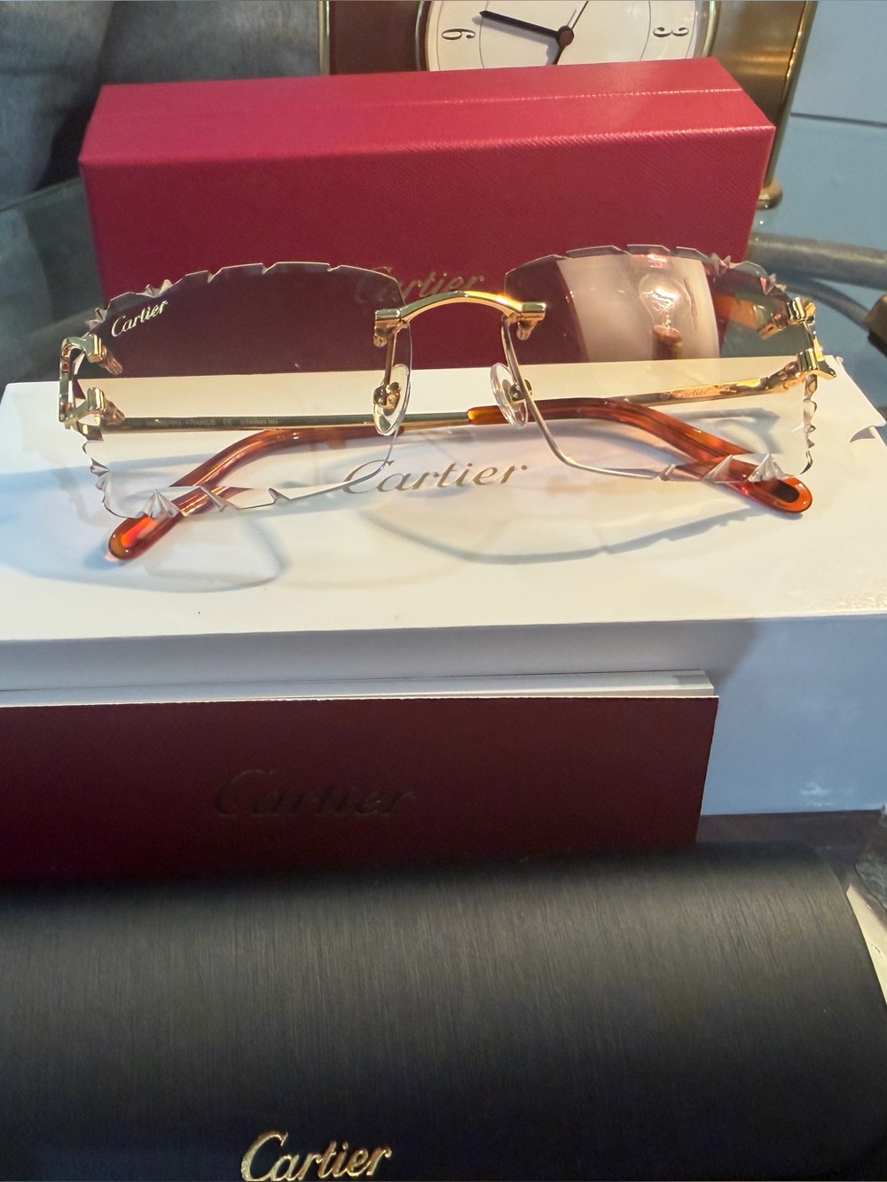Cartier Men's Rimless Sunglasses with Purple Lenses and Gold Bridge